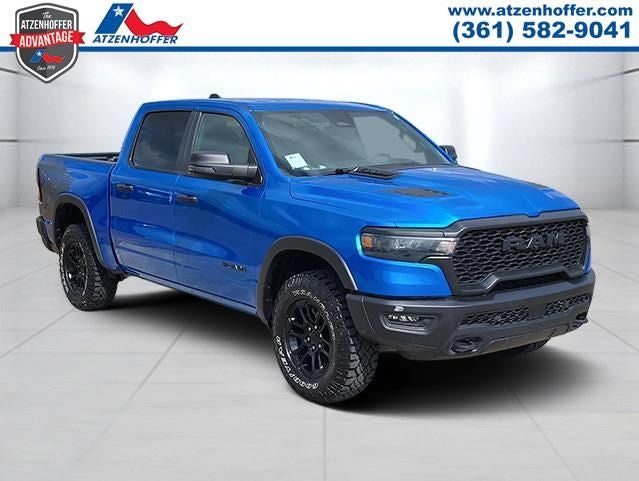 2025 RAM 1500 Rebel in Blue Pearl — front three-quarter view