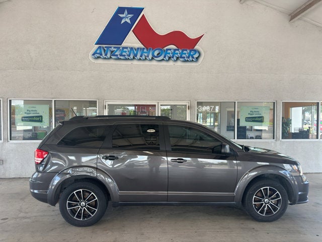 2018 Dodge Journey SE in Granite — front three-quarter view