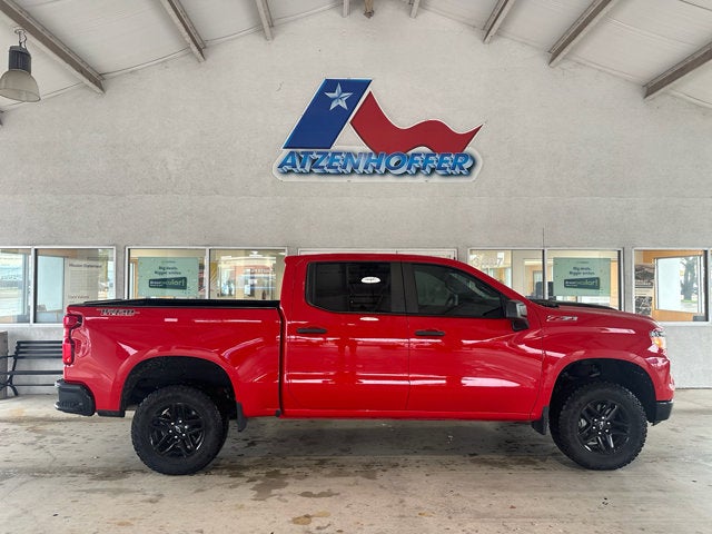 2024 Chevrolet Silverado 1500 Custom Trail Boss in Red — front three-quarter view